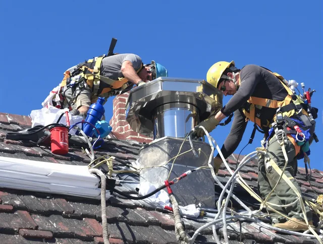 Protective chimney cap installed by Southborough Chimney Sweep in Southborough, MA