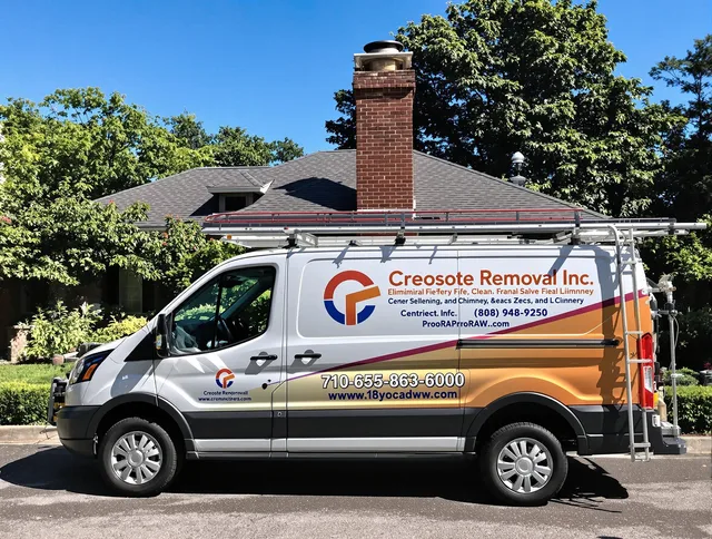 Southborough Chimney Sweep technician removing creosote safely in Southborough, MA